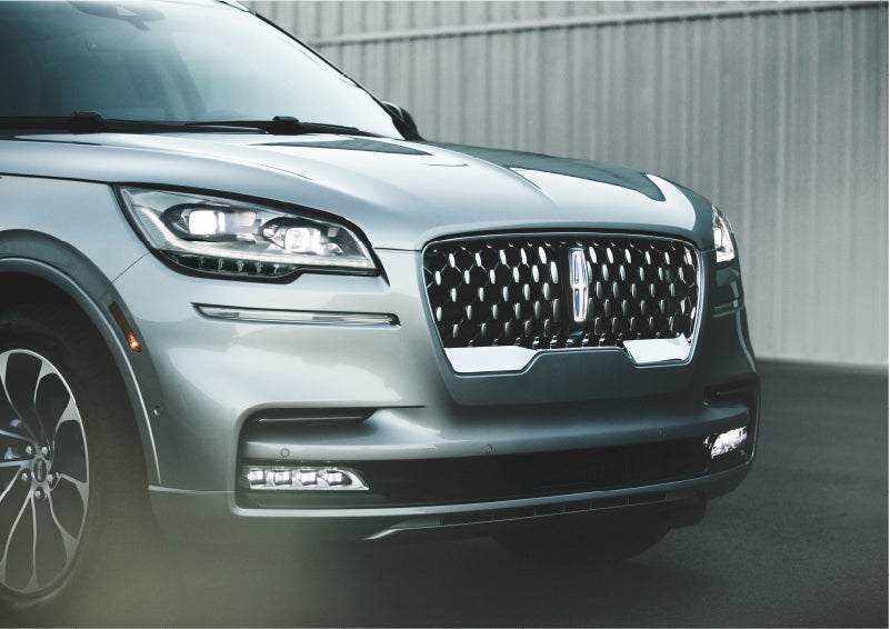 The available adaptive pixel LED headlamps of the 2023 Lincoln Aviator® SUV activated | Buss Lincoln in McHenry IL
