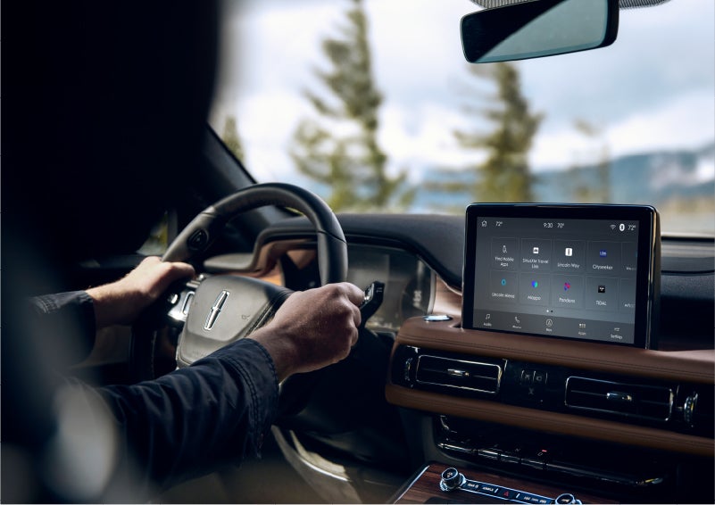 The Lincoln+Alexa app screen is displayed in the center screen of a 2023 Lincoln Aviator® Grand Touring SUV | Buss Lincoln in McHenry IL