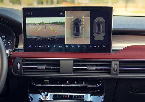 The driver of a 2024 Lincoln Corsair® SUV is shown selecting the drive mode. | Buss Lincoln in McHenry IL