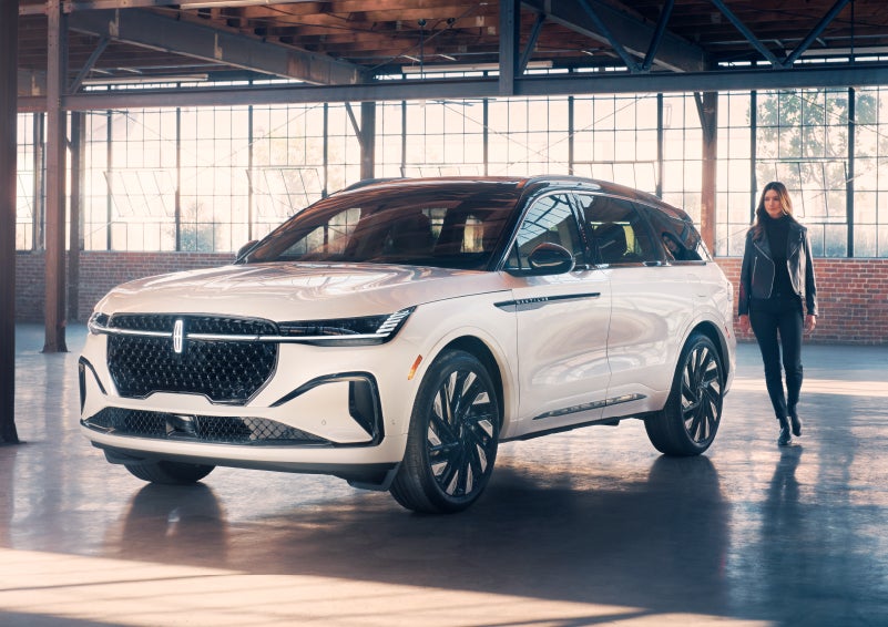 A person approaches a 2024 Lincoln Nautilus® SUV. | Buss Lincoln in McHenry IL