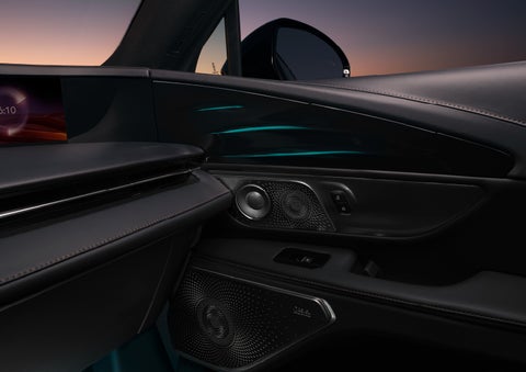 Selectable ambient lighting glows in the passenger door panel. | Buss Lincoln in McHenry IL