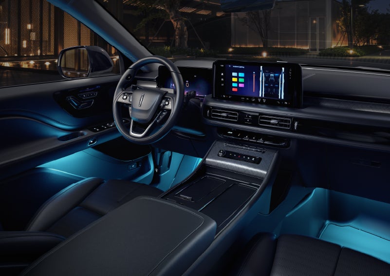 Deep blue ambient lighting glows from various places within a 2026 Lincoln Aviator® SUV. | Buss Lincoln in McHenry IL
