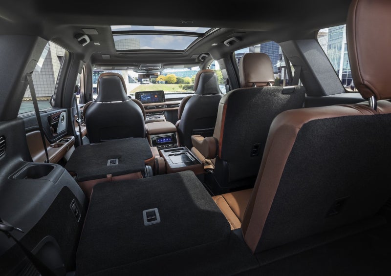 One side of the PowerFold® third-row seat and a second-row seat are folded forward in the 2026 Lincoln Aviator® SUV. | Buss Lincoln in McHenry IL