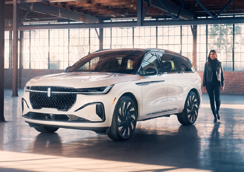 A person approaches a 2026 Lincoln Nautilus® SUV. | Buss Lincoln in McHenry IL