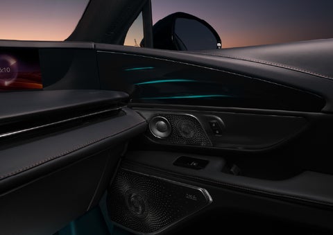 Selectable ambient lighting glows in the passenger door panel. | Buss Lincoln in McHenry IL